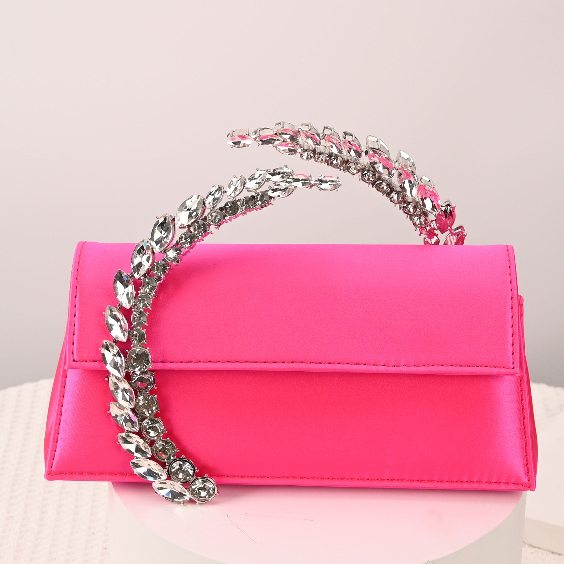 Theia Hardware-Detailed Evening Clutch — runway angle